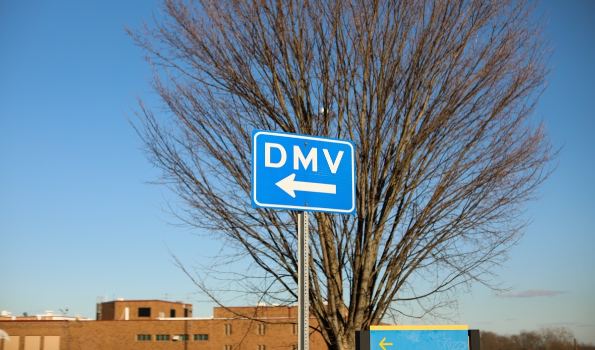 DMV sign street showing where to get drivers registration