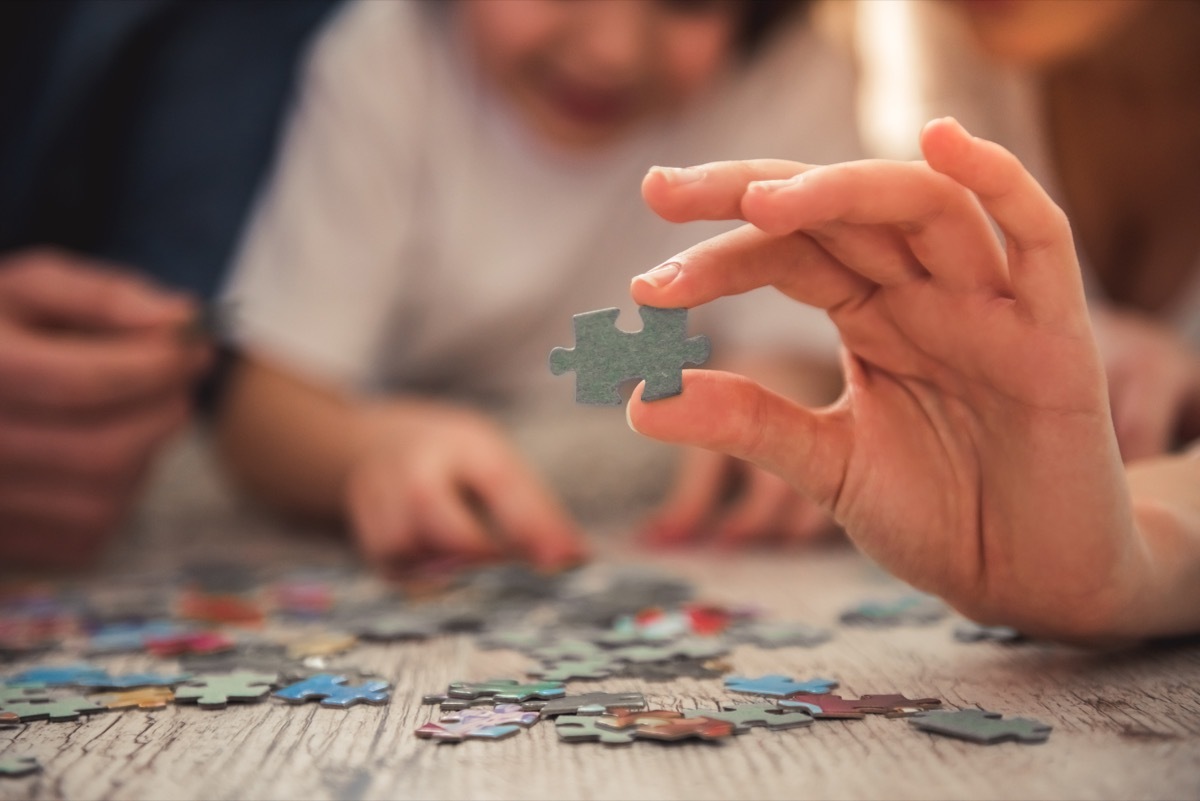 Family doing puzzle together