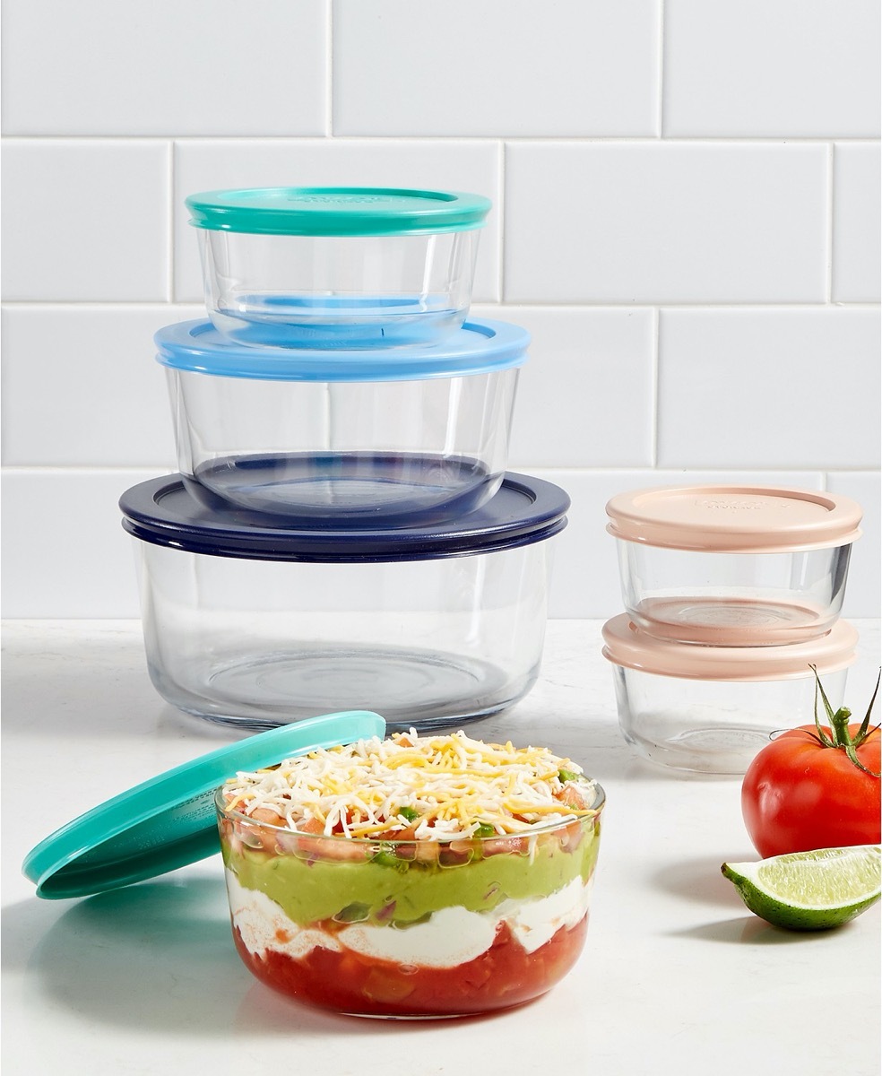 set of pyrex bowls with colorful tops