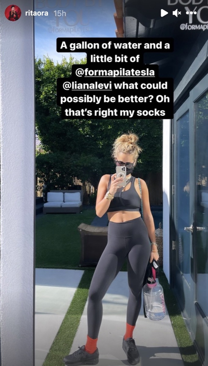 rita ora taking selfie in workout gear