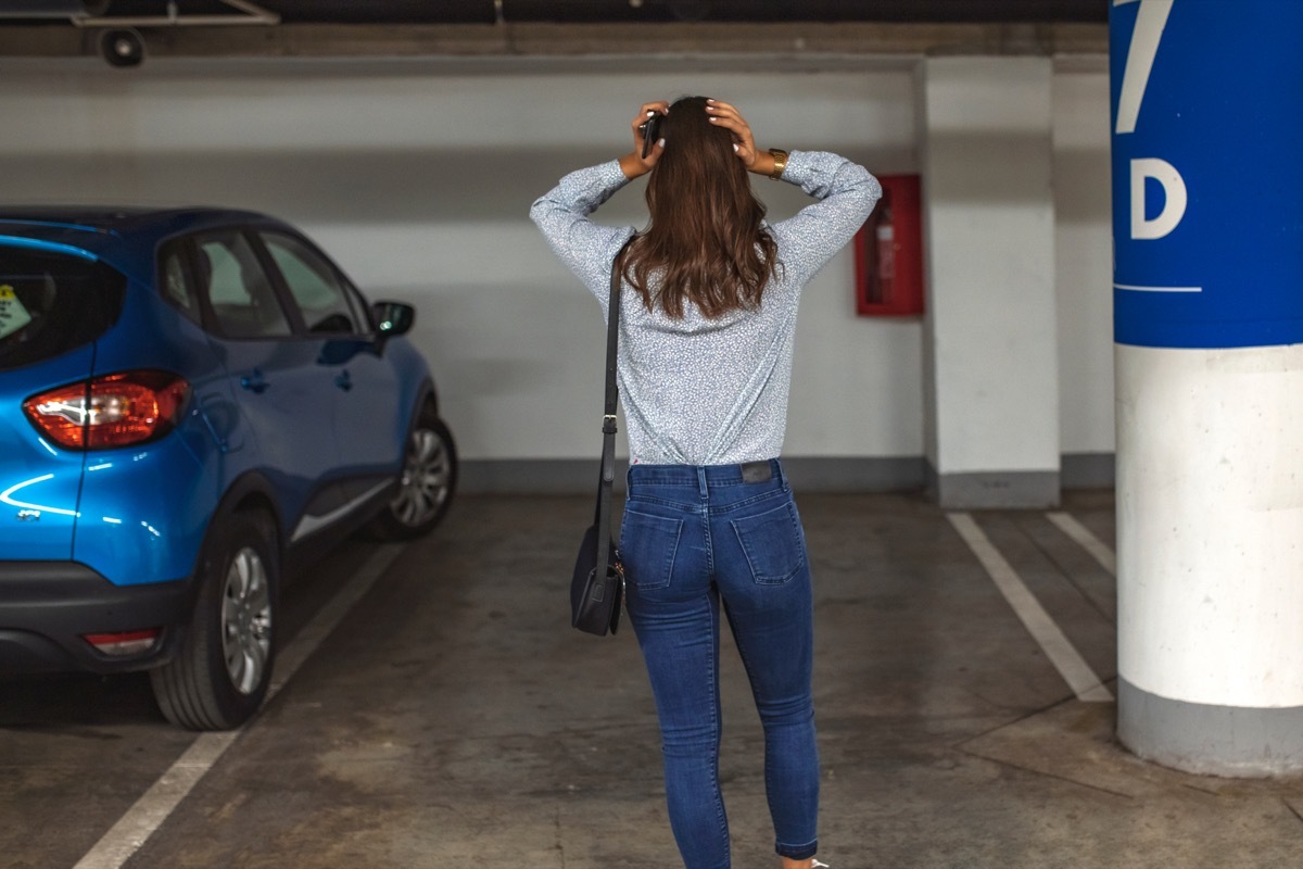 woman realizes car has been stolen from garage