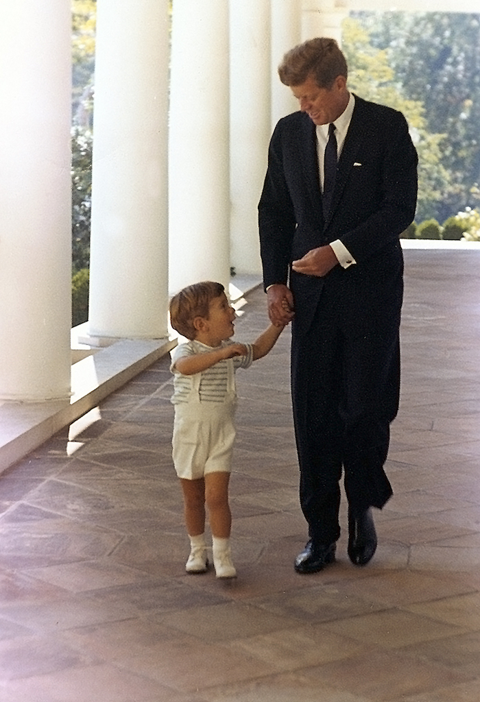 John F Kennedy Jr with Father Kennedys