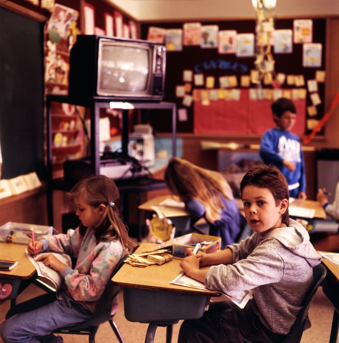 1990s Bully Sitting in a Classroom