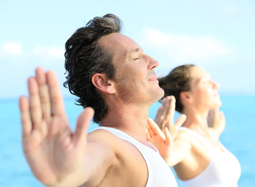 Couple, yoga, older man