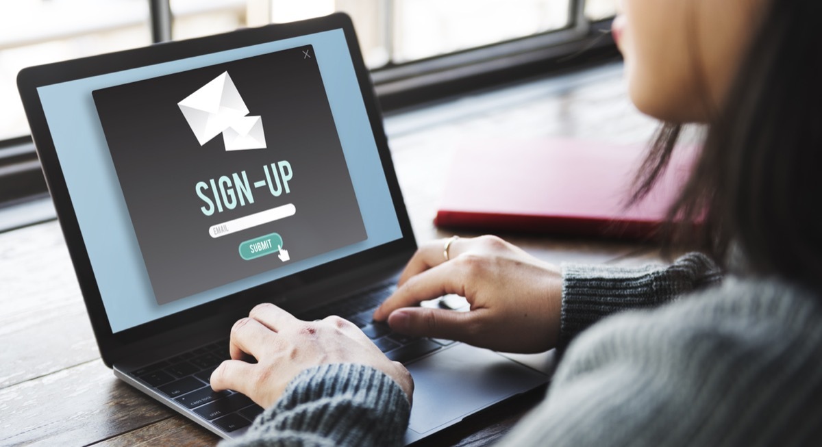 woman signing up for membership