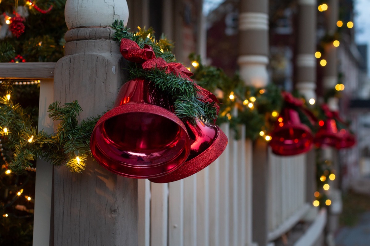 a home banister full of holiday decorations