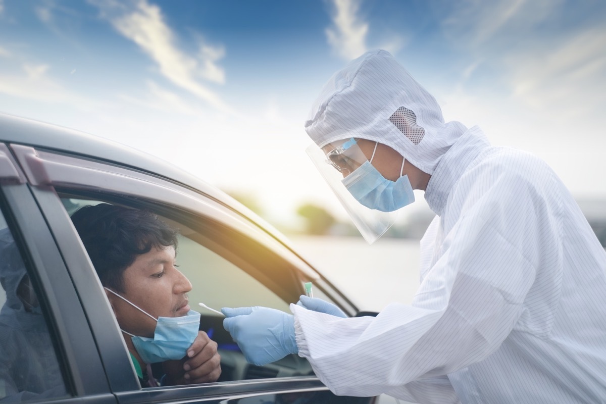 Man in his car getting coronavirus test