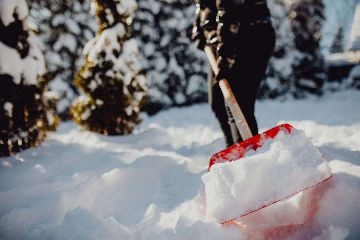 Person shoveling snow.