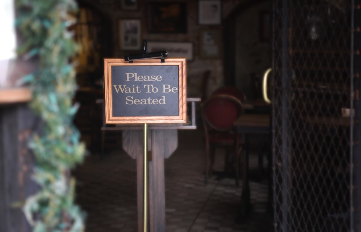 sign: please wait to be seated