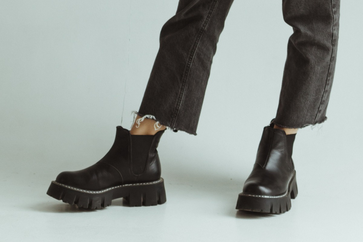 young woman wearing chelsea boots