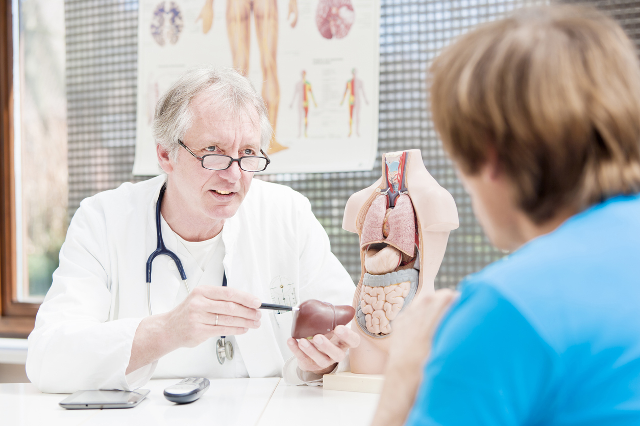 Doctor explaining liver problems to patient