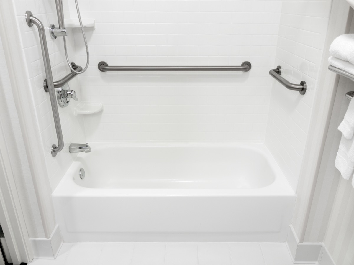 Handicapped disabled access bathroom bathtub with grab bars