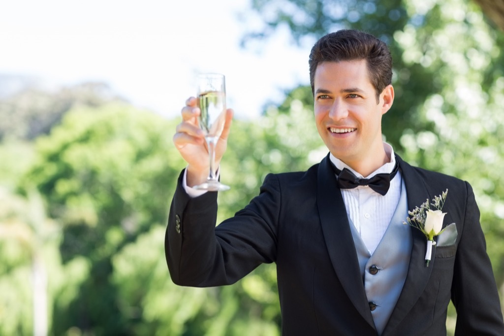 man giving toast 20 Old-Fashioned Wedding Traditions That Nobody Does Anymore