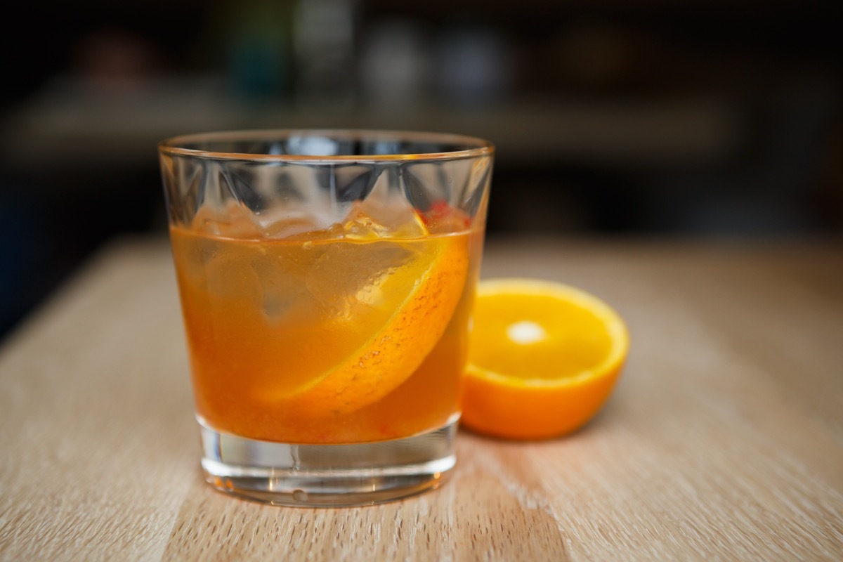 screwdriver cocktail with orange on table