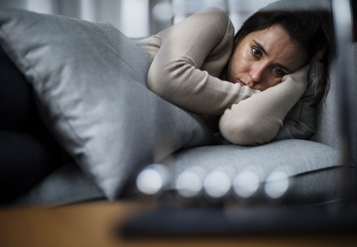 Depressed woman on couch