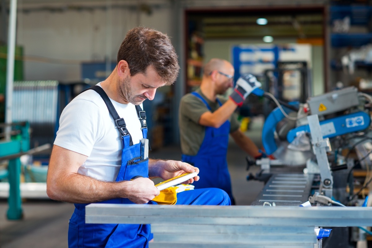 factory worker working with metal