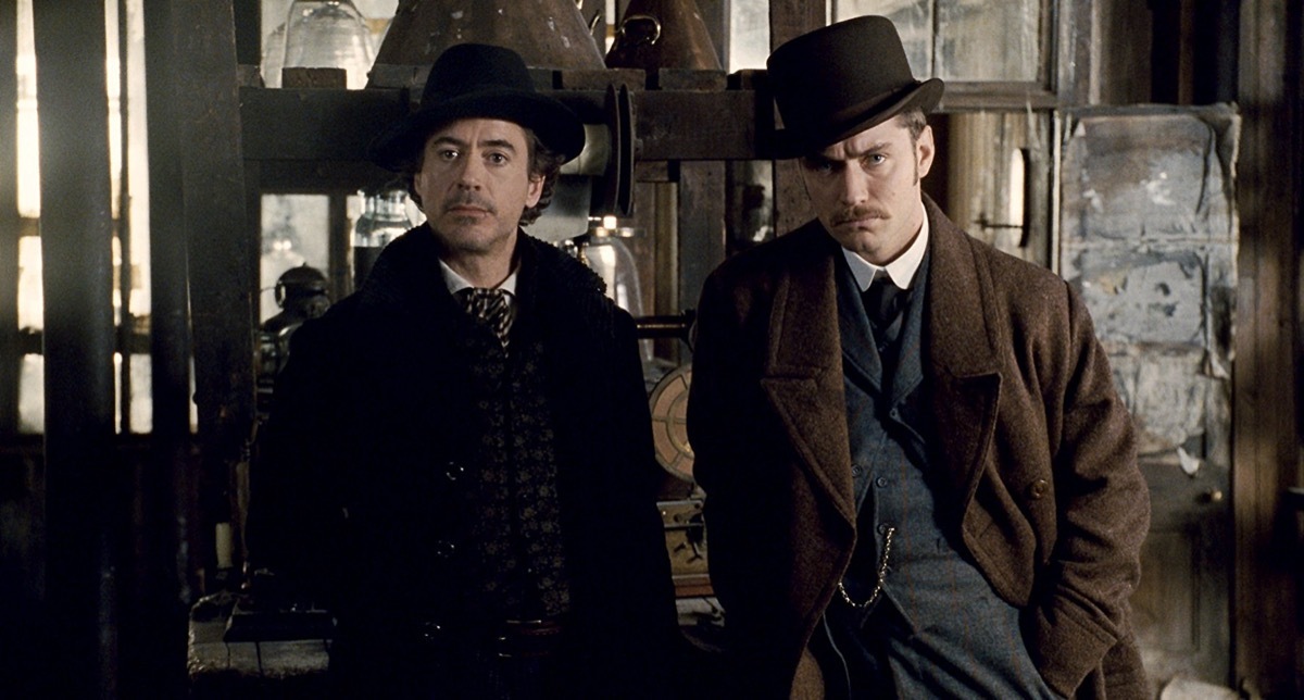 Jude Law and Robert Downey Jr. in Sherlock Holmes (2009)- best mystery movies 