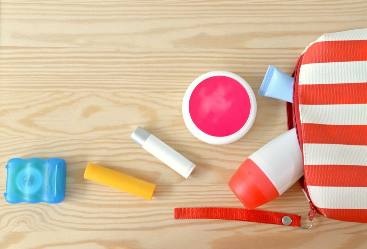 Colorful toiletries on the wooden cupboard