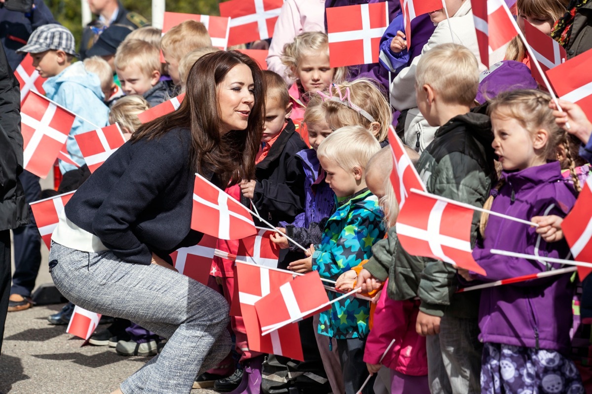 Children holding Denmark flags